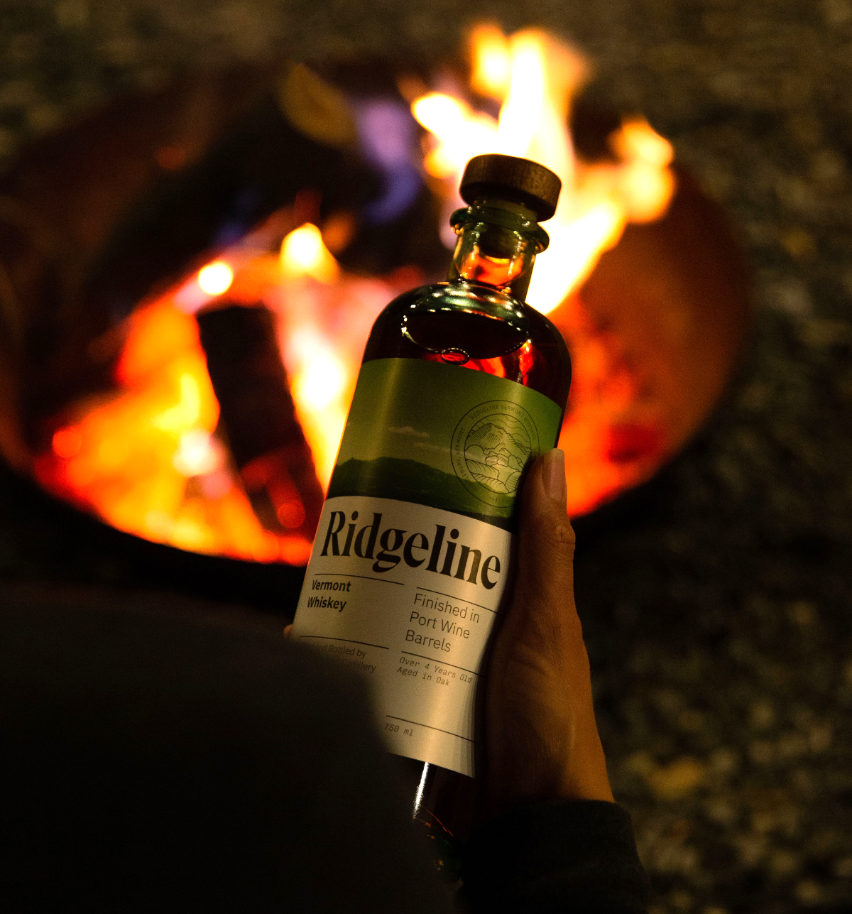 Ridgeline beside a campfire